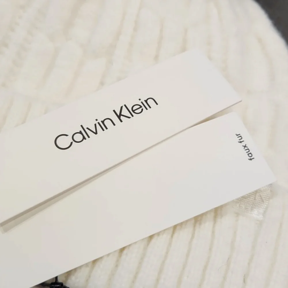 NWT Calvin Klein Cream Faux Fur Pom-Pom Knit Beanie Hat One Size MSRP $48 - Picture 5 of 10